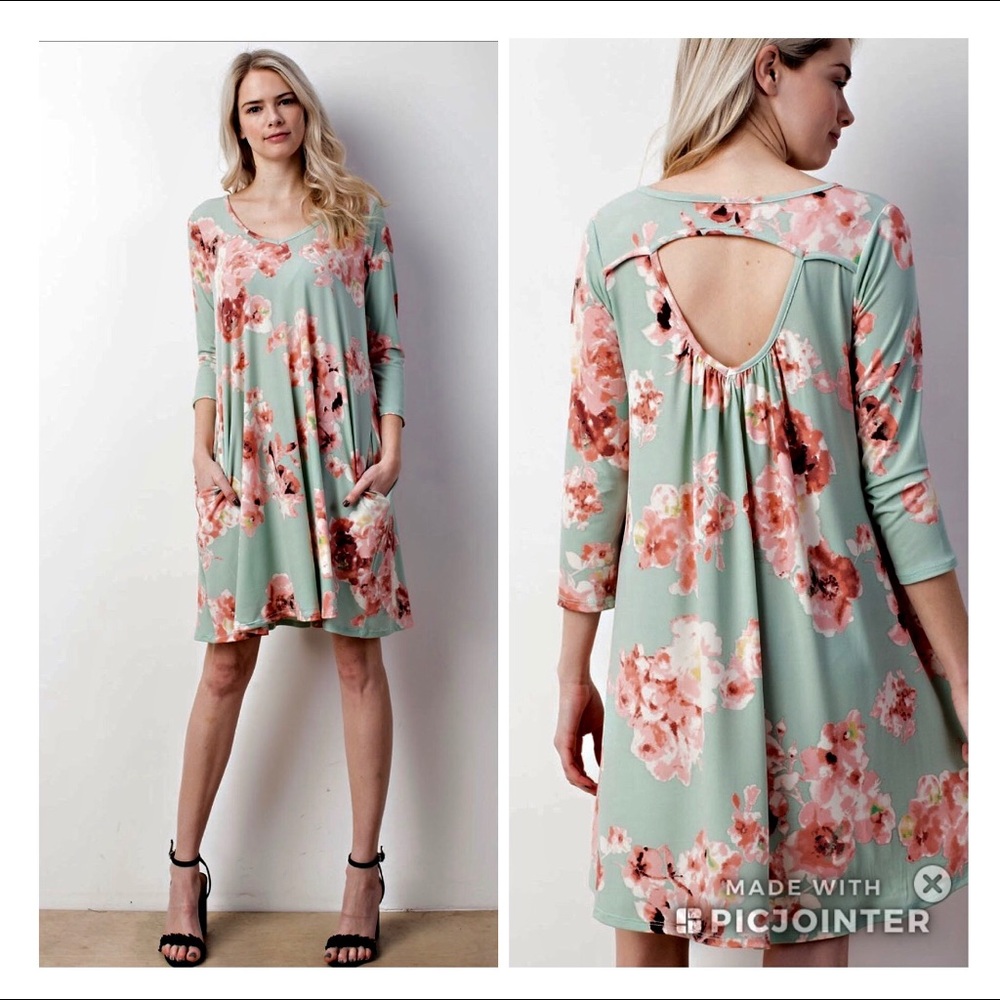 Floral dress. Ivory only.